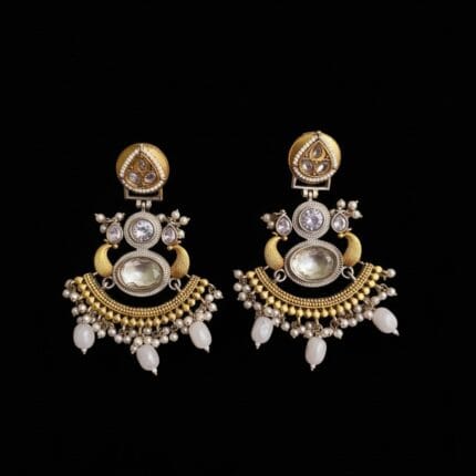 Fusion Chandbali Earrings with Translucent Stone & Diamond placed over pure black background