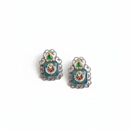 Two pairs of traditional brass Monalisha stone stud earrings. Pair has skyblue stones it intricate silver frames and pearl accents.