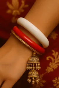 Married woman wearing traditional shakha pola bangles, symbolising Bengali cultural heritage and marital tradition."