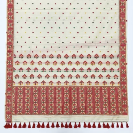 Off white bamboo cotton saree with red geometric woven borders and red tassels