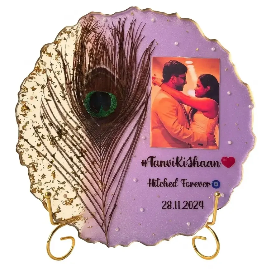 Peacock Design Customised Resin Photo Frame Metal stand with circular frame of lilac resin. Gold scalloped edges. Couple's photo and peacock feather.